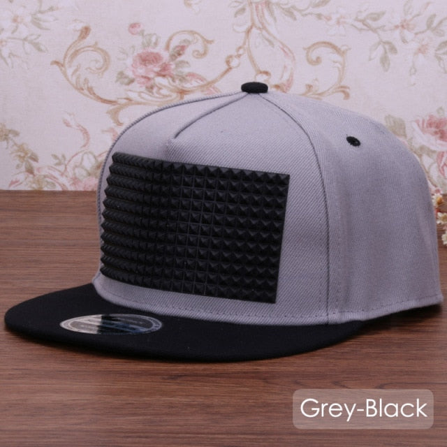 Fancy  Snapback Baseball Cap with 3D Silicon Square Pyramid Decorations..